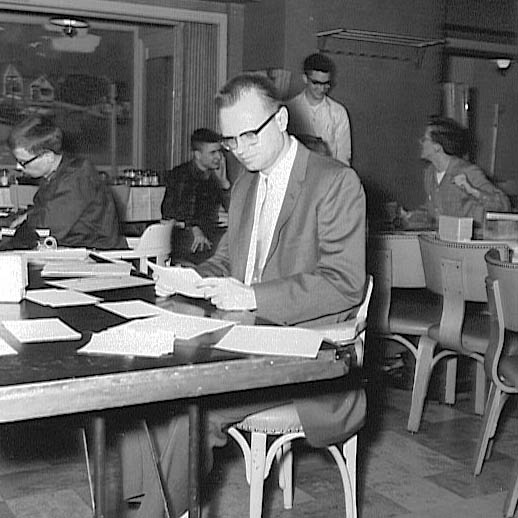 Fred Sorensen, hard at work directing yet another PCC tournament, in February of 1962.